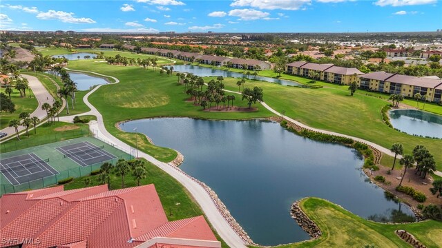12170 Kelly Sands Way Unit 721, Fort Myers, FL 33908 - aerial perspective of suburban area featuring a large body of water and a golf course