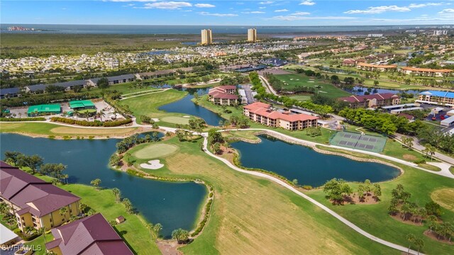 12170 Kelly Sands Way Unit 721, Fort Myers, FL 33908 - aerial view of residential area featuring a nearby body of water and a golf course