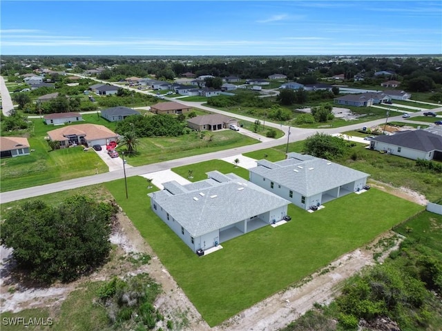 420-422 Grant Blvd, Lehigh Acres, FL 33974 - aerial perspective of suburban area