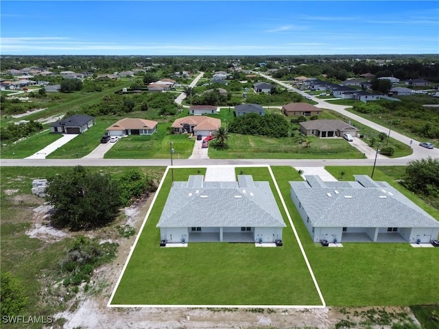 420-422 Grant Blvd, Lehigh Acres, FL 33974 - aerial perspective of suburban area