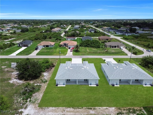 420-422 Grant Blvd, Lehigh Acres, FL 33974 - aerial perspective of suburban area
