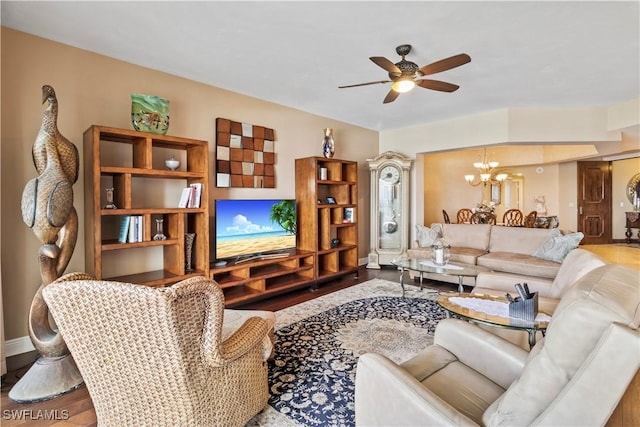 6021 Silver King Blvd Unit 302, Cape Coral, FL 33914 - living area featuring a chandelier, ceiling fan, and wood finished floors