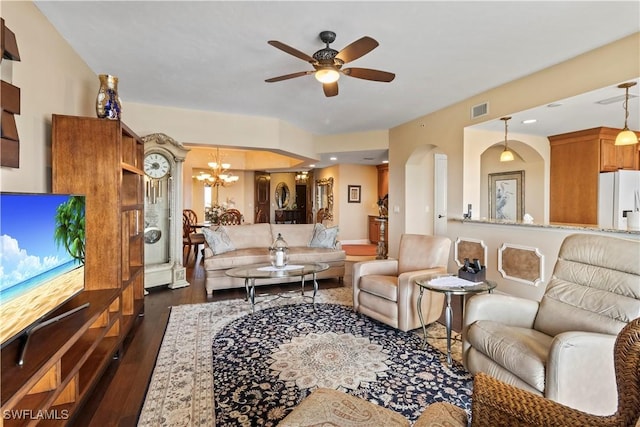 6021 Silver King Blvd Unit 302, Cape Coral, FL 33914 - living area featuring a ceiling fan, dark wood-style floors, a chandelier, and arched walkways