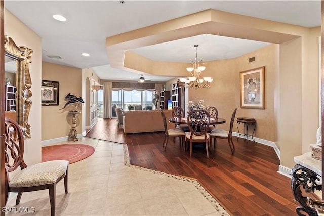 6021 Silver King Blvd Unit 302, Cape Coral, FL 33914 - dining area with tile patterned floors, a chandelier, and recessed lighting