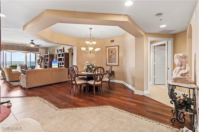 6021 Silver King Blvd Unit 302, Cape Coral, FL 33914 - dining room with hardwood / wood-style floors, ceiling fan, a chandelier, and recessed lighting