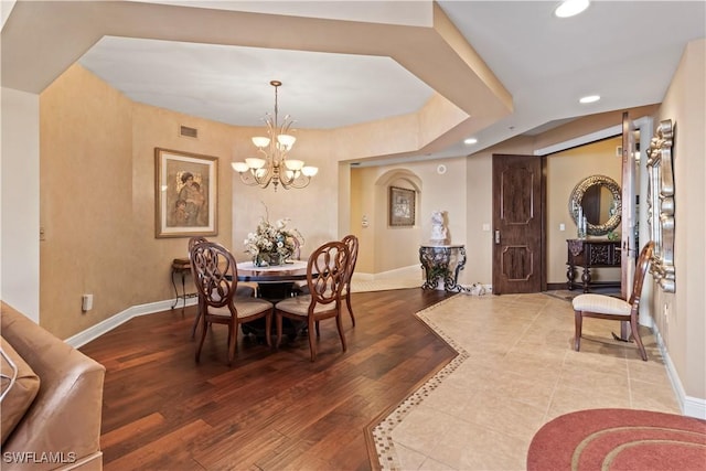 6021 Silver King Blvd Unit 302, Cape Coral, FL 33914 - dining room featuring recessed lighting, a chandelier, and wood finished floors