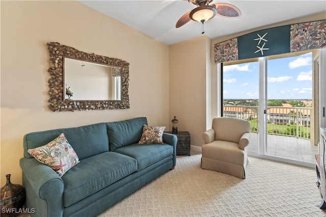 6021 Silver King Blvd Unit 302, Cape Coral, FL 33914 - living room featuring a ceiling fan and carpet flooring