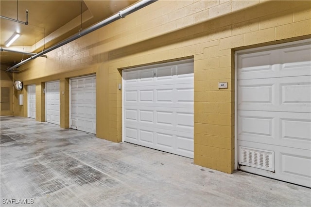 6021 Silver King Blvd Unit 302, Cape Coral, FL 33914 - view of garage