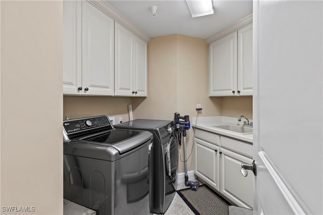 6021 Silver King Blvd Unit 302, Cape Coral, FL 33914 - laundry room featuring cabinet space, washer and dryer, and tile patterned flooring