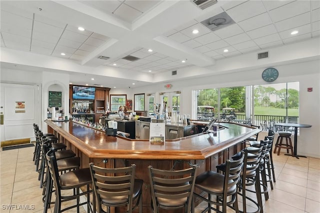 2232 Carnaby Ct, Lehigh Acres, FL 33973 - community bar area with light tile patterned floors, recessed lighting, beamed ceiling, and coffered ceiling