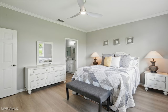 2232 Carnaby Ct, Lehigh Acres, FL 33973 - bedroom with ornamental molding, light wood finished floors, ensuite bathroom, and ceiling fan