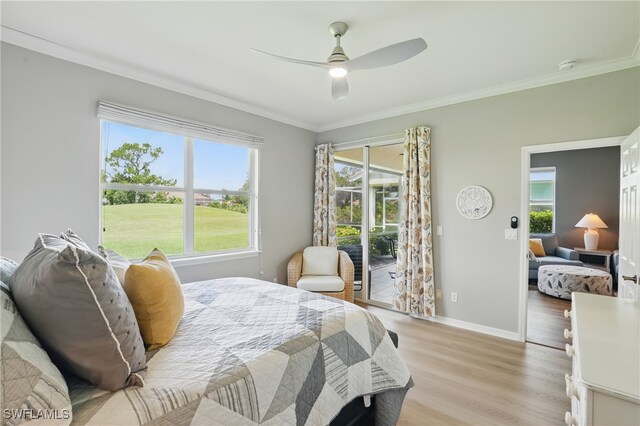2232 Carnaby Ct, Lehigh Acres, FL 33973 - bedroom featuring access to outside, crown molding, light wood-type flooring, and ceiling fan