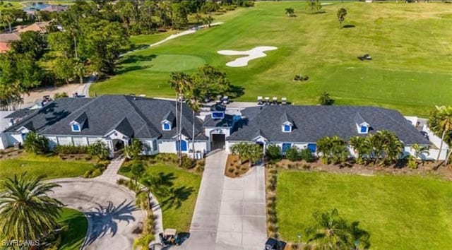 2232 Carnaby Ct, Lehigh Acres, FL 33973 - aerial perspective of suburban area with a golf course