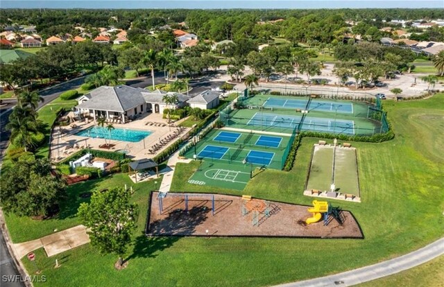 2232 Carnaby Ct, Lehigh Acres, FL 33973 - aerial view of a pool