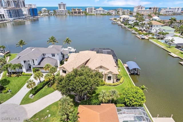 431 Palm Ct, Naples, FL 34108 - aerial perspective of suburban area featuring a large body of water