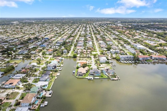431 Palm Ct, Naples, FL 34108 - aerial view of property's location with nearby suburban area and a large body of water