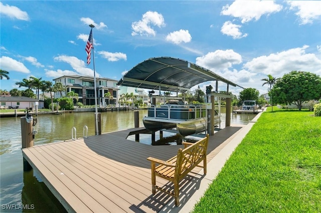 431 Palm Ct, Naples, FL 34108 - dock area featuring boat lift, a water view, and a lawn