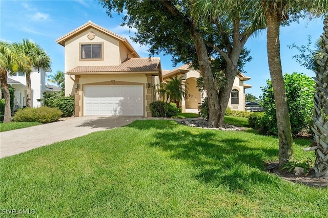 431 Palm Ct, Naples, FL 34108 - mediterranean / spanish-style house with stucco siding, driveway, a front lawn, a tile roof, and a garage