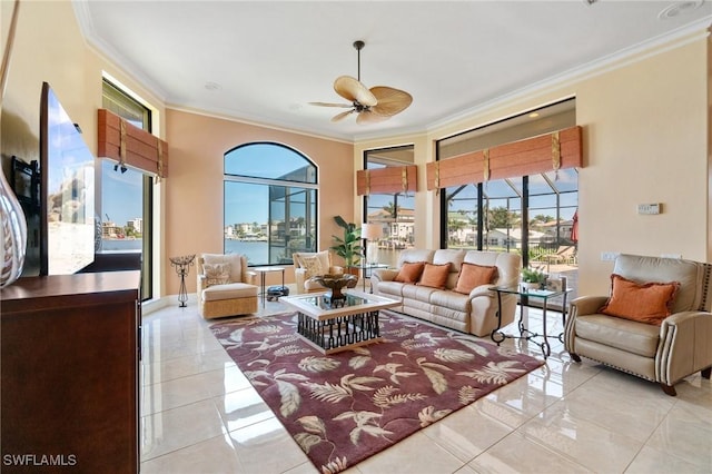 431 Palm Ct, Naples, FL 34108 - living room with crown molding, healthy amount of natural light, a ceiling fan, and light tile patterned floors