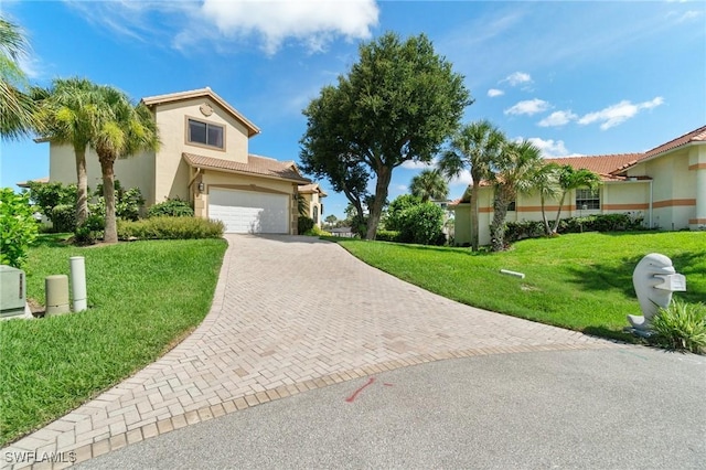 431 Palm Ct, Naples, FL 34108 - view of front of property with decorative driveway, an attached garage, stucco siding, a tiled roof, and a front yard