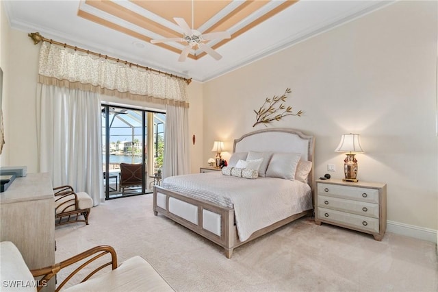 431 Palm Ct, Naples, FL 34108 - bedroom featuring light carpet, ornamental molding, access to exterior, a tray ceiling, and a water view