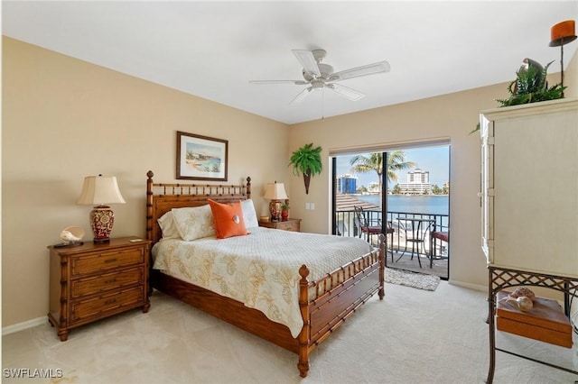 431 Palm Ct, Naples, FL 34108 - bedroom with light colored carpet, access to exterior, and ceiling fan