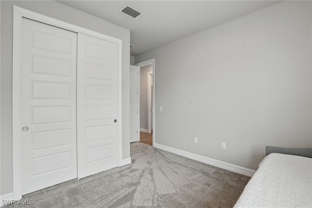 16420 Settlers Way, Punta Gorda, FL 33982 - carpeted bedroom featuring a closet and baseboards