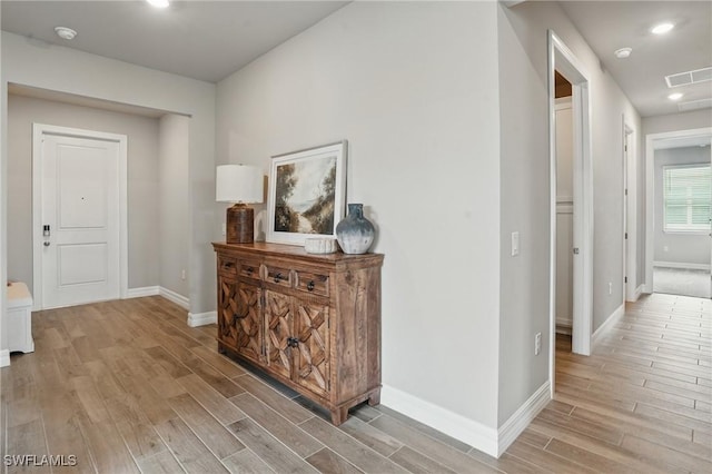16420 Settlers Way, Punta Gorda, FL 33982 - corridor with light wood finished floors and recessed lighting