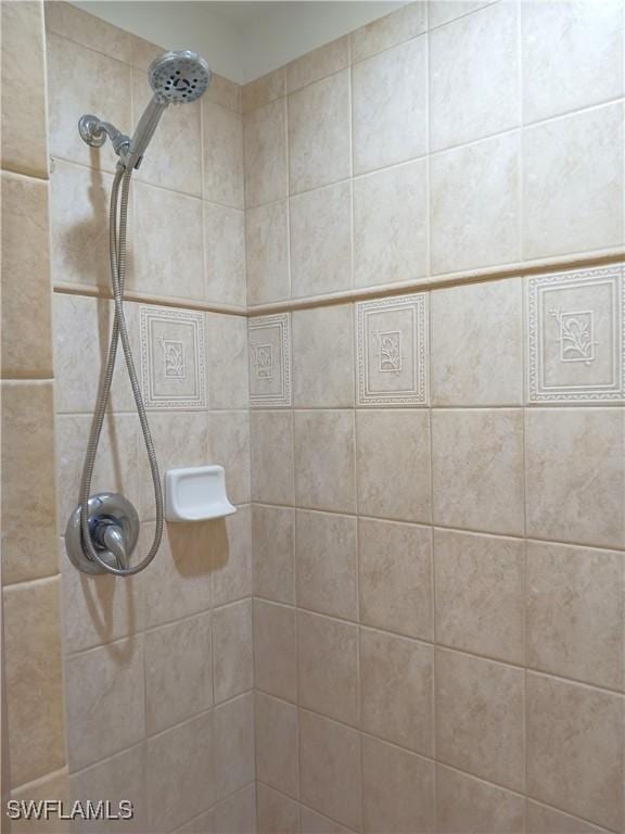 7725 Woodbrook Cir Unit 3504, Naples, FL 34104 - bathroom view of a tile shower