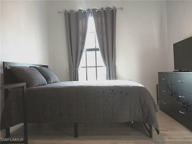 7725 Woodbrook Cir Unit 3504, Naples, FL 34104 - bedroom featuring wood finished floors