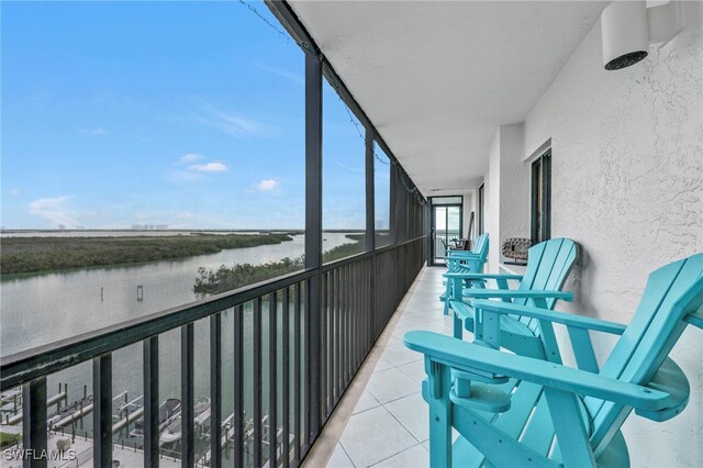 26235 Hickory Blvd Unit 9A, Bonita Springs, FL 34134 - balcony featuring a water view