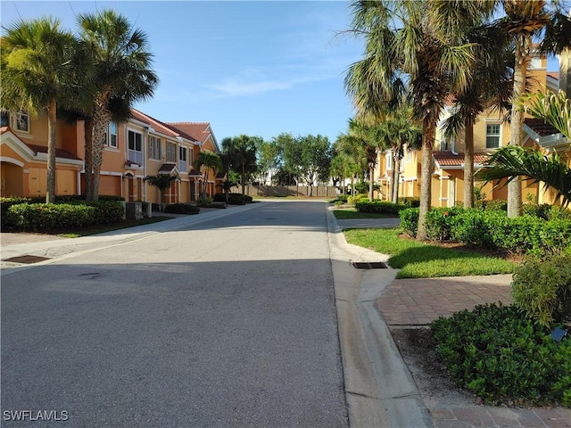 1776 Concordia Lake Cir Unit 2902, Cape Coral, FL 33909 - view of asphalt street with a residential view, curbs, and sidewalks