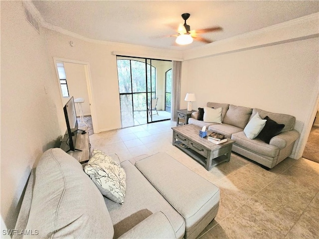 12975 Positano Cir Unit 104, Naples, FL 34105 - living area with ornamental molding and a ceiling fan