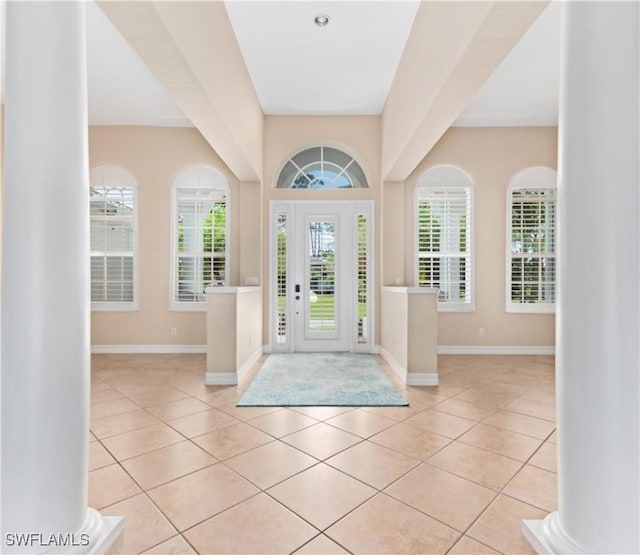 17091 Laurelin Ct, North Fort Myers, FL 33917 - entryway featuring tile patterned flooring and baseboards