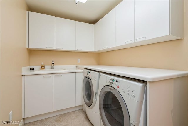 1050 Borghese Ln Unit 605, Naples, FL 34114 - laundry area featuring washer and clothes dryer and cabinet space