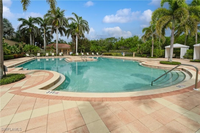 1050 Borghese Ln Unit 605, Naples, FL 34114 - community pool with a patio area and a gazebo