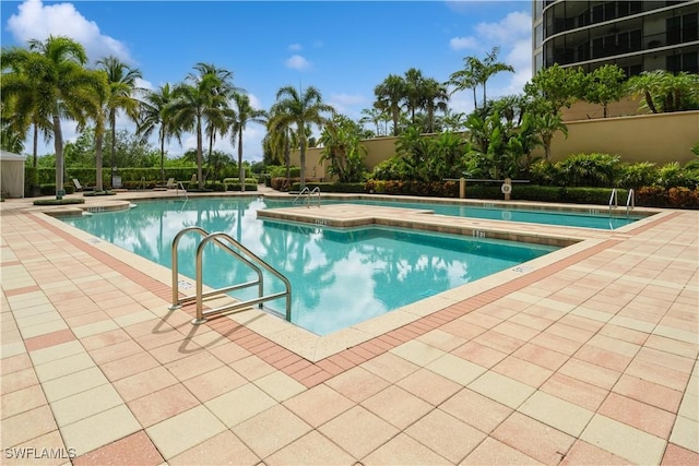 1050 Borghese Ln Unit 605, Naples, FL 34114 - community pool with a patio
