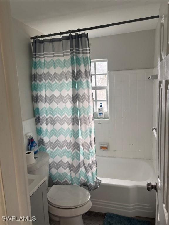 152 Prospect Ave, Fort Myers, FL 33905 - bathroom featuring vanity, shower / bath combination with curtain, and tile walls