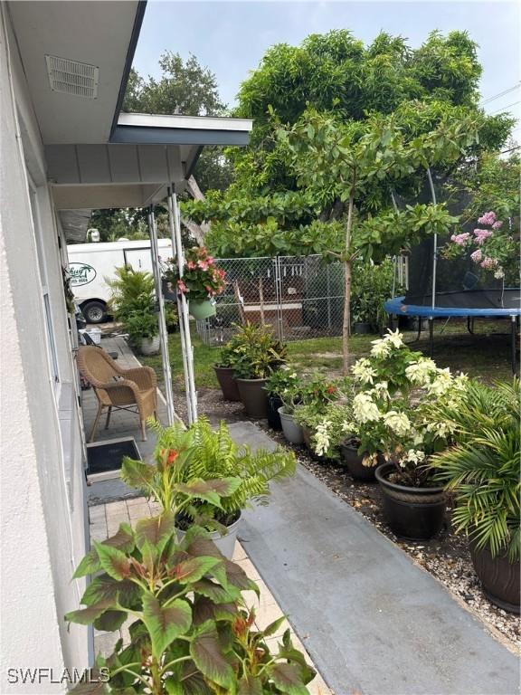 152 Prospect Ave, Fort Myers, FL 33905 - view of yard featuring a trampoline