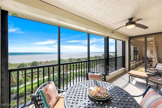 100 N Collier Blvd Unit 303, Marco Island, FL 34145 - sunroom / solarium with a water view, ceiling fan, outdoor dining area, and plenty of natural light
