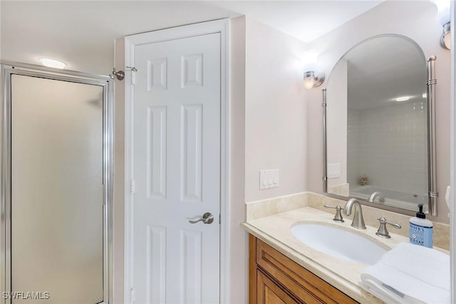 100 N Collier Blvd Unit 303, Marco Island, FL 34145 - bathroom with a stall shower and vanity