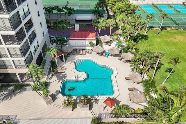 100 N Collier Blvd Unit 303, Marco Island, FL 34145 - community pool featuring a patio