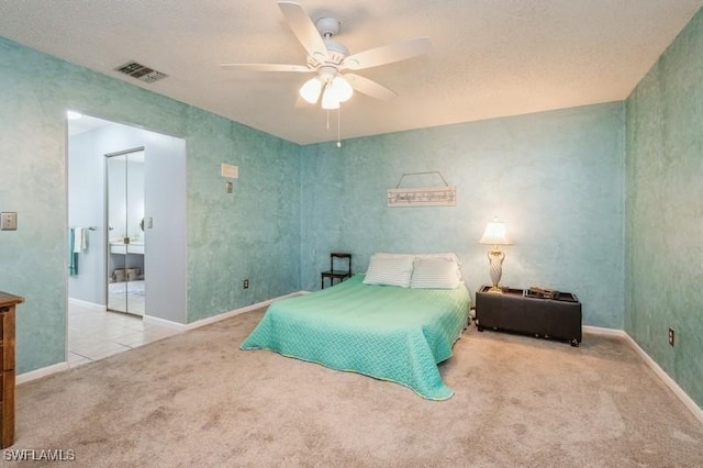 9749 Maplecrest Cir, Lehigh Acres, FL 33936 - bedroom featuring carpet, baseboards, ceiling fan, and a closet