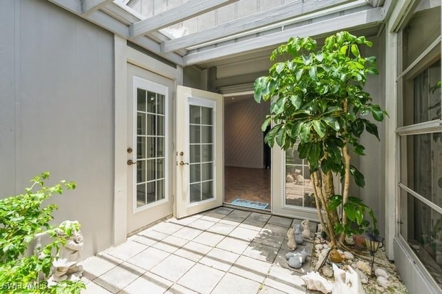 9749 Maplecrest Cir, Lehigh Acres, FL 33936 - unfurnished sunroom featuring french doors