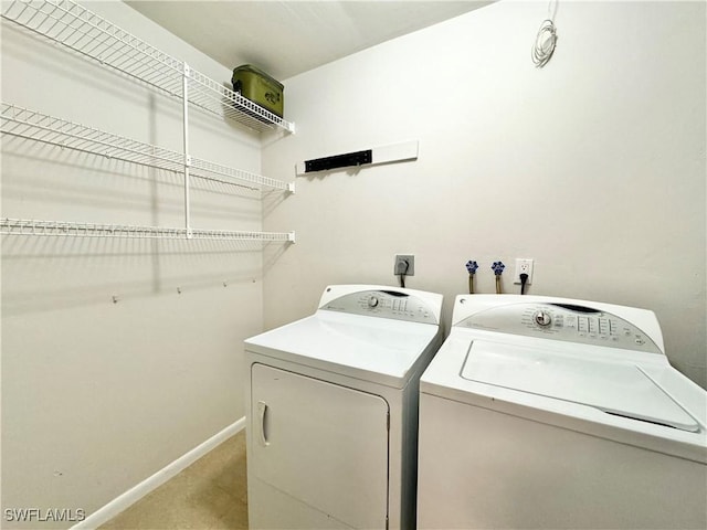 1110 Rushmore Ave N, Lehigh Acres, FL 33936 - washroom with independent washer and dryer and light colored carpet