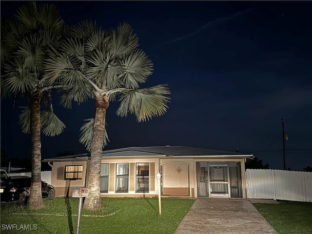 1110 Rushmore Ave N, Lehigh Acres, FL 33936 - view of front of property featuring concrete driveway and a metal roof