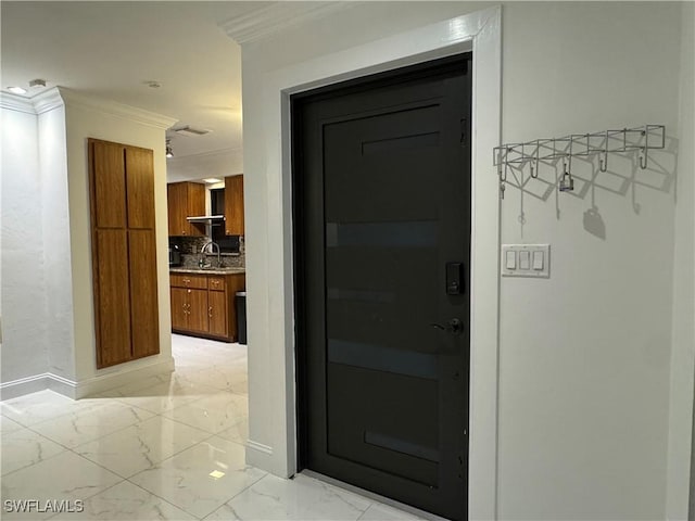 1110 Rushmore Ave N, Lehigh Acres, FL 33936 - property entrance with a sink