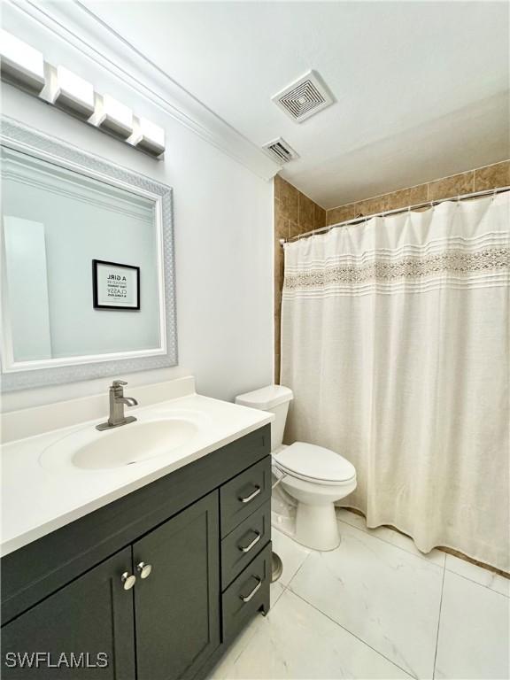 1110 Rushmore Ave N, Lehigh Acres, FL 33936 - bathroom with vanity and curtained shower