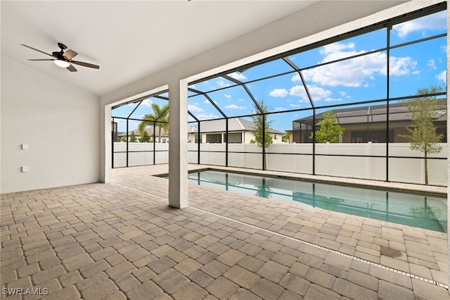 3318 NW 1st Ter, Cape Coral, FL 33993 - view of swimming pool with a patio, a ceiling fan, and glass enclosure
