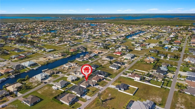 3318 NW 1st Ter, Cape Coral, FL 33993 - aerial view of property and surrounding area featuring nearby suburban area